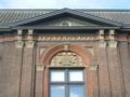 Detailopname opschrift Teekenschool en cartouches, 2012 (foto Ton de Groot).